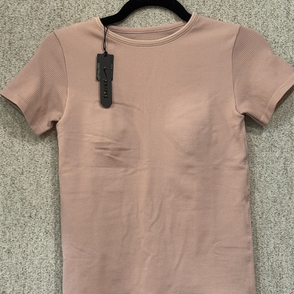 SKIMS Tops - SKIMS Nike Ribbed Seamless Top, size Medium. NWT.